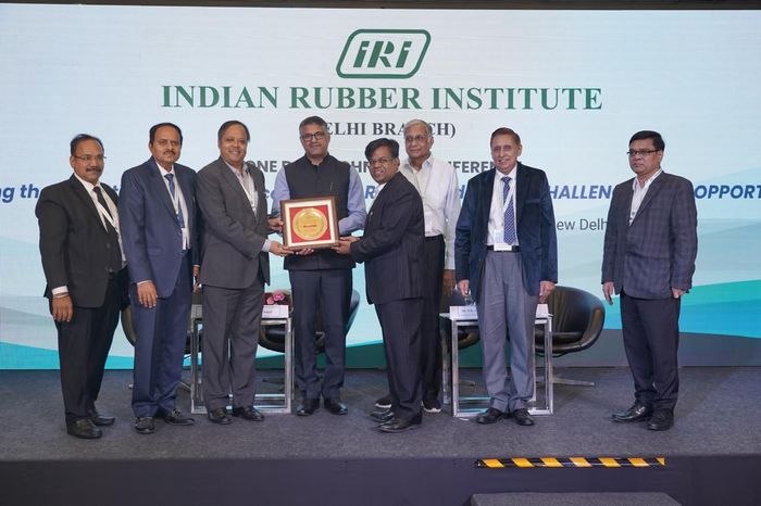 Felicitation on the IRI dais at the Indian Rubber Institute conference, New Delhi