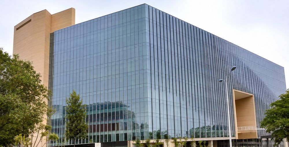 Glass and aluminium curtain-wall facade by Alpro Industries / The Rishabh Winpro