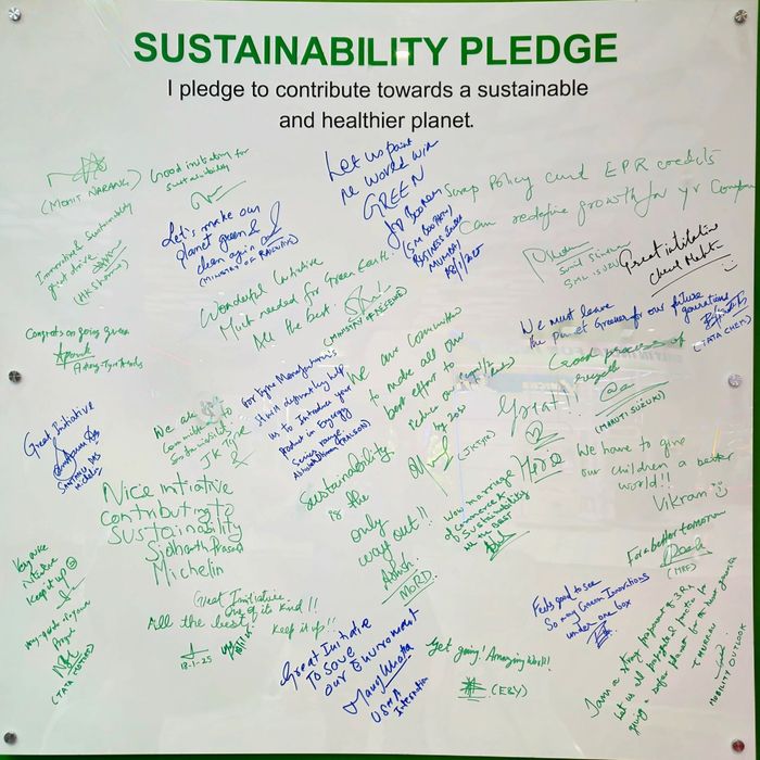 Sustainability Pledge board signed by industry leaders at the GoGreen Eternal booth